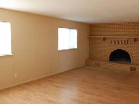 Living Room With Wood Burning Fireplace